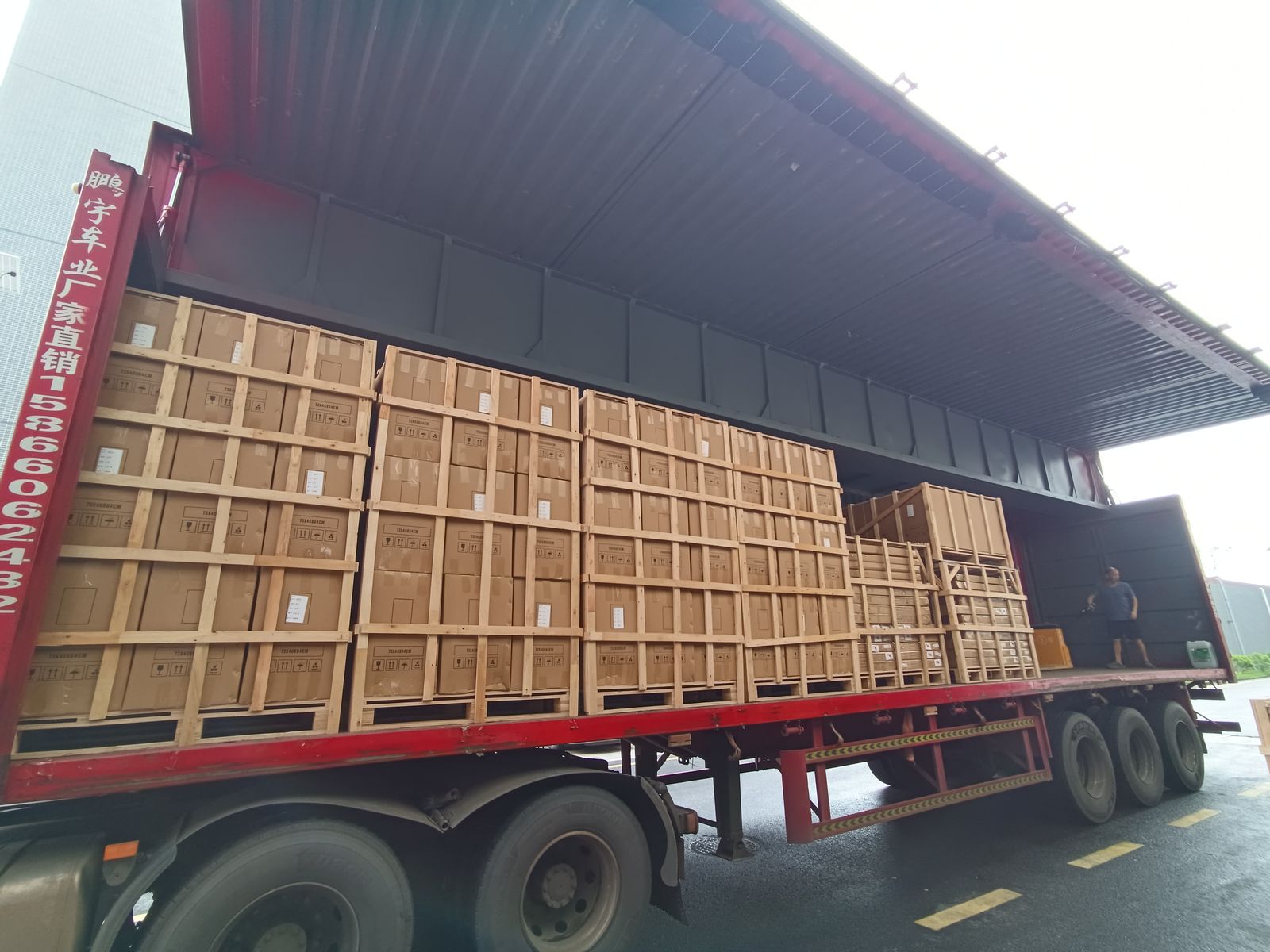 Cartons crated on pallets ready for loading