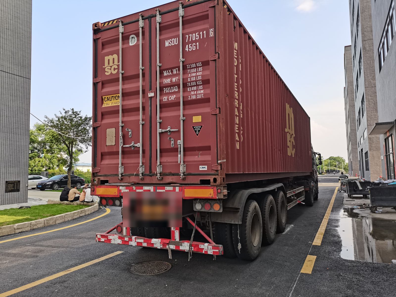 Container truck departing for the port
